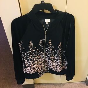 Light weight polyester jacket with velour sleeves